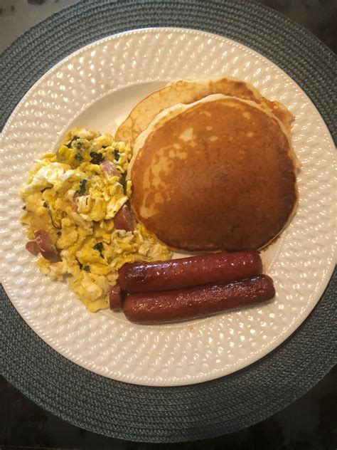 Breakfast Pancakes With Beef Sausage Scrambled Eggs With Cheese