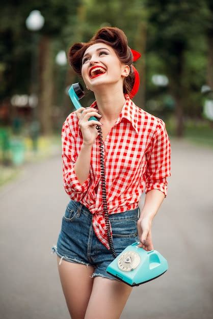 Premium Photo Smiling Pinup Girl With Retro Rotary Phone Vintage