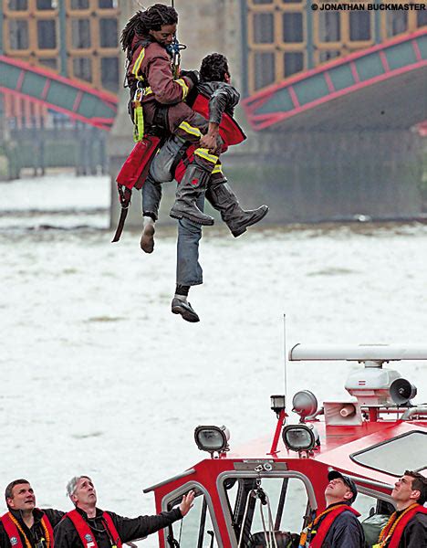Hero Firefighter Catches Suicide Jumper Daily Mail Online