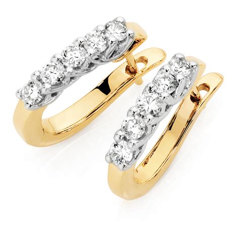 Check spelling or type a new query. Hoop Earrings with 1/2 Carat TW of Diamonds in 18ct Yellow & White Gold