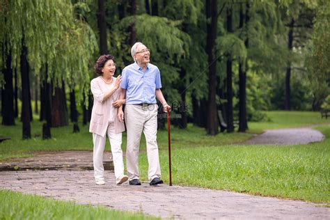 Elderly Couple Walking Outdoors In The Morning Picture And Hd Photos