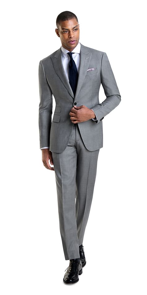 See How We Turned Down The Volume On The Plaid Suit With This Gray On