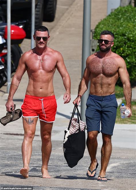 Actor Luke Evans Flaunts His Ripped Physique In Tiny Red Shorts At Sydney S Bondi Beach Daily
