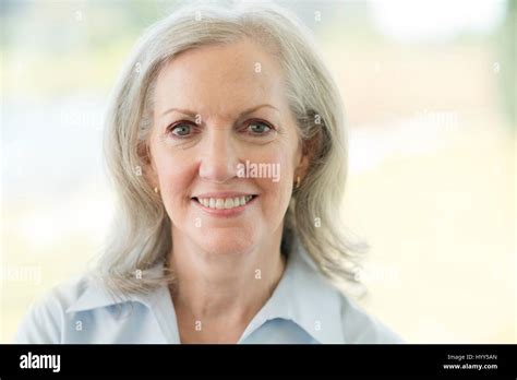 Senior Woman Smiling Portrait Stock Photo Alamy