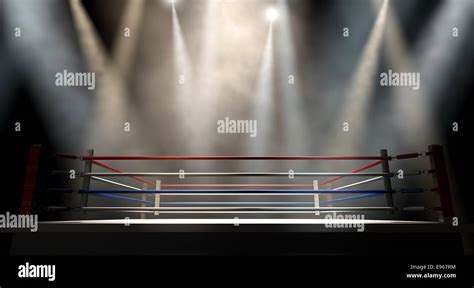 A Regular Boxing Ring Surrounded By Ropes Spotlit By Various Lights On