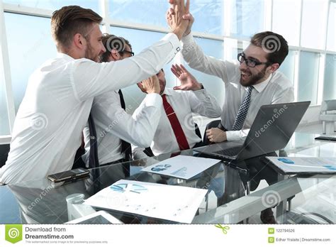 Happy Employees Give Each Other A High Five Stock Photo Image Of
