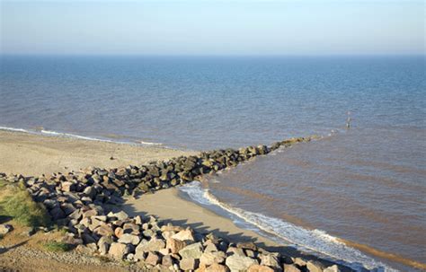 Longshore Drift And Rock Armour Groyne On The Holderness Coast At