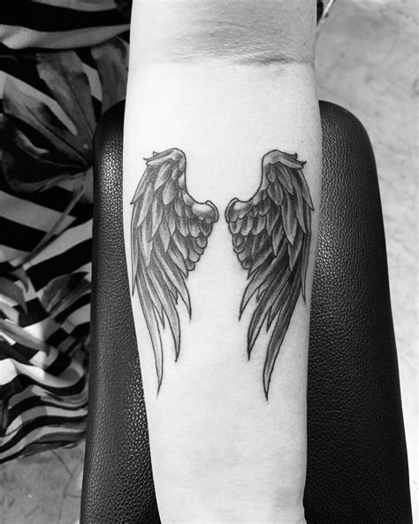 Fallen Angel Wings Tattoo On Arm Best Tattoo Ideas