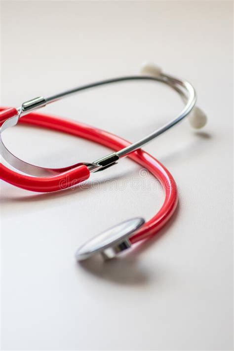 Red Stethoscope In Doctors Office For Professional Cardio Checkup And
