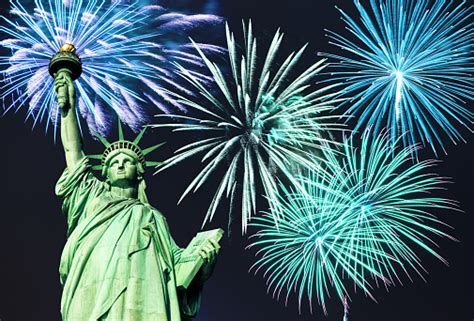 Fireworks Behind The Statue Of Liberty Stock Photo Download Image Now