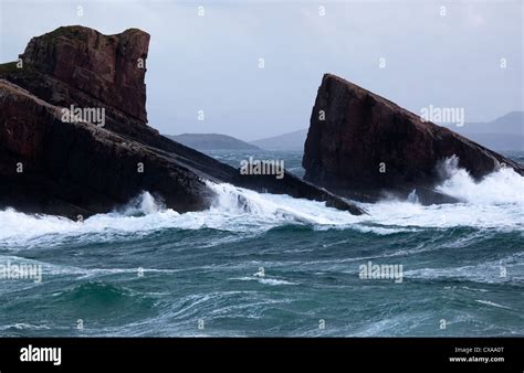 Rough Seas Pound Split Rock At Clachtoll Bay In The North West