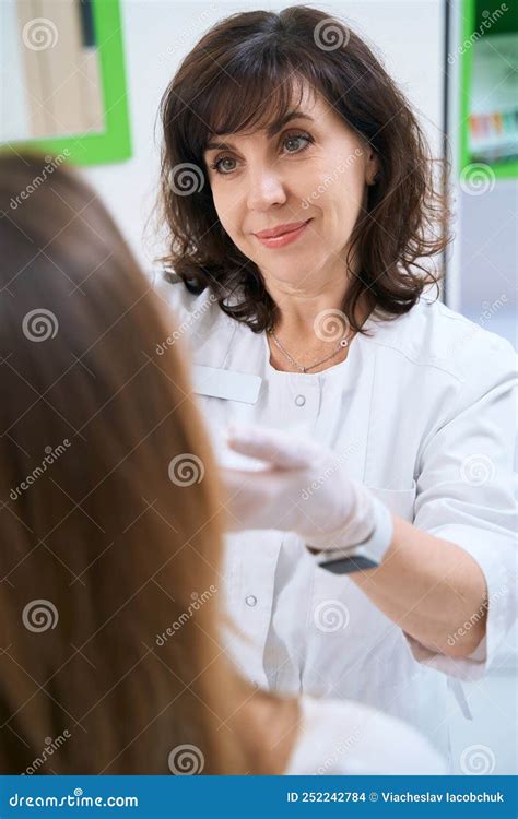 Dermatologist Doctor Is Examining The Patient Face Stock Photo Image