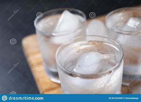 Shot Glasses Of Vodka With Ice Cubes On Table Closeup Stock Image