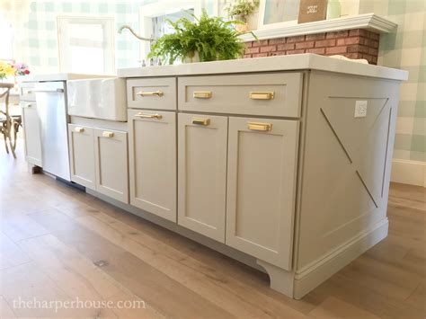 I also had to use a jig saw (rockwell bladerunner) to cut out the space for the baseboard trim on two of the cabinets. Kitchen Island Trim and Lights | The Harper House