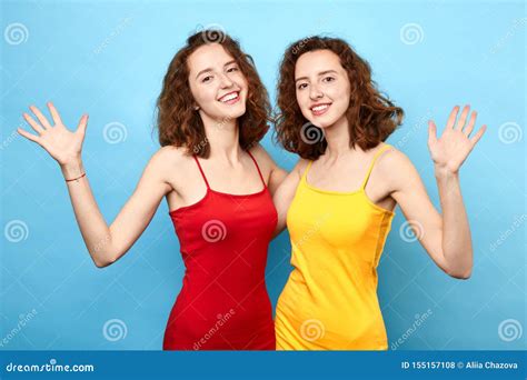 Charming Happy Women With Raised Palms Says Hello Stock Photo Image