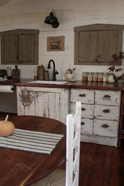 Those rustic kitchen cabinets on the background would easily follow its lead. Our Farm Kitchen | Farmhouse style kitchen cabinets ...