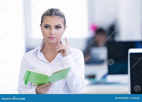 Portrait Of Busy Secretary Looking At Camera Stock Image Image Of