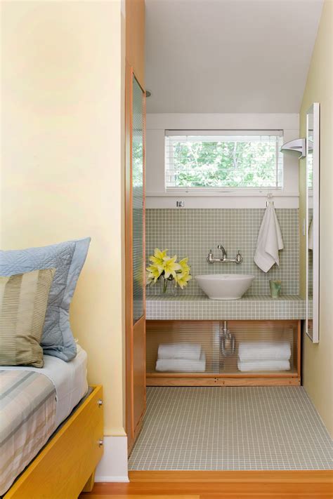 Use vertical space with ladder storage. 28 Towel Display Ideas for Pretty (and Practical) Bathroom ...