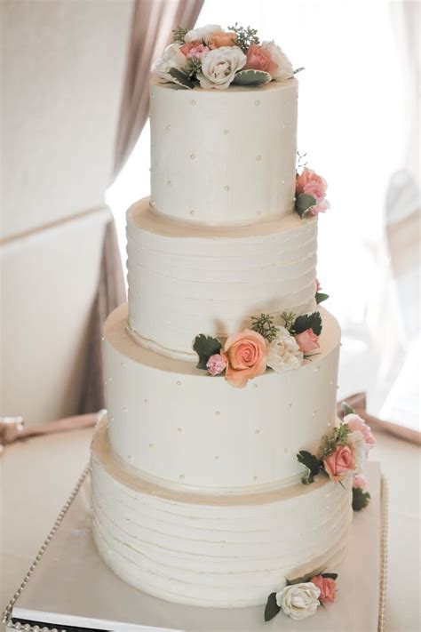 Four Tier Wedding Cake With Real Flowers