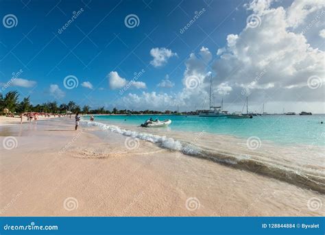 people relaxing on the brownes beach in barbados editorial stock image image of boat