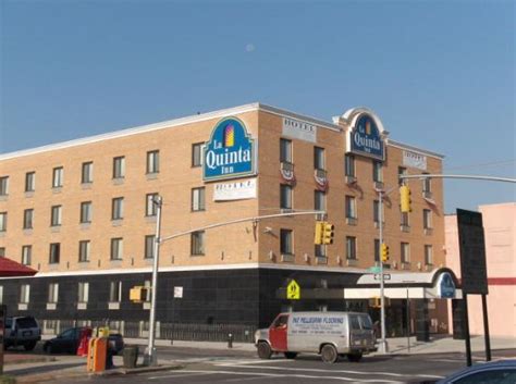 Breakfast, wifi, and parking are free at this hotel. Crossroads & entrance - Picture of La Quinta Inn Queens ...