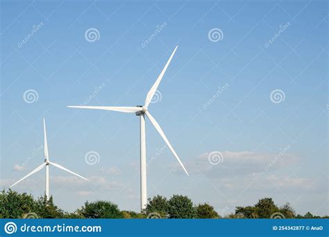 Wind Turbines Generating Electricity With Blue Sky Renewable Energy