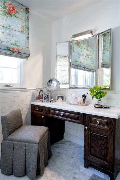 Modern bathroom vanity design with stunning use of mirrors and lighting above it. Traditional Master Bathroom With Makeup Vanity | HGTV