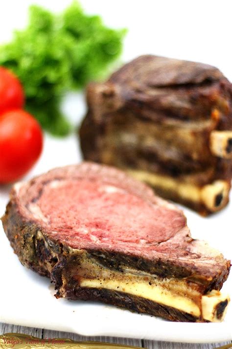 Remove from the oven and slice between. Standing Bone-in Ribeye Roast Recipe - Valya's Taste of Home