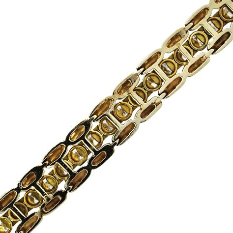 Available in various styles, carat sizes, and precious metals. 14k Yellow Gold Diamond Tennis Bracelet with Tennis Bracelet Jacket
