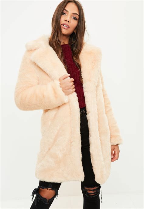 lyst missguided cream faux fur slim coat in natural