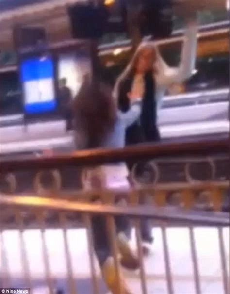 The Shocking Moment Two Brawling Women End Up Fighting On The Tracks At A Railway Station