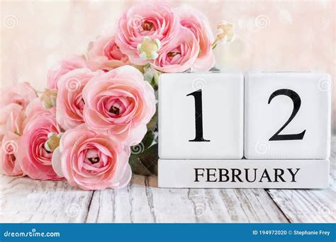 February 12th Calendar Blocks With Pink Ranunculus Stock Photo Image