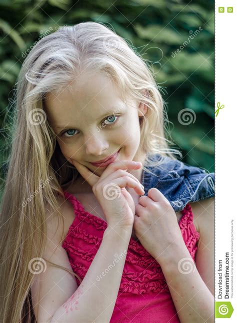Portrait Of A Beautiful Blonde Little Girl With Long Hair Stock Image