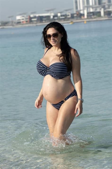 Casey Batchelor Shows Off Her Baby Bump In A Striped Bikini While Enjoying The Beach In Dubai Uae