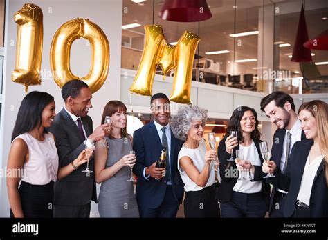 Business People Celebrate Meeting Target In The Office Stock Photo Alamy