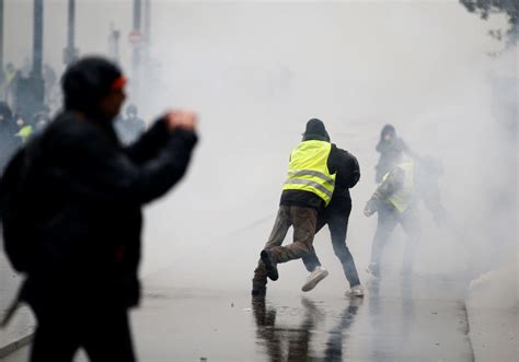 Yellow Vests Protest In Paris As Troops Join Police To Prevent Trouble