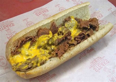 authentic philly cheesesteak recipes from geno s and pat s hey make both then fight about it