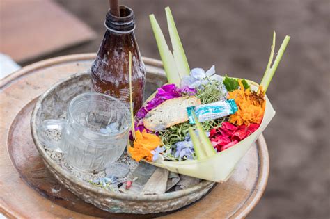 Traditional Balinese Offerings To Gods In Bali With Flowers And Aromatic Sticks Tropical Island