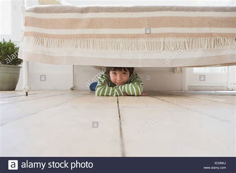 Hiding Underneath Bed High Resolution Stock Photography And Images Alamy