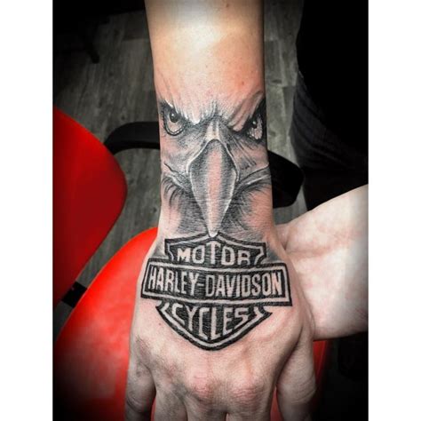 Harley bar and shield with roses tattoo. 95+ Adventurous Harley Davidson Tattoos