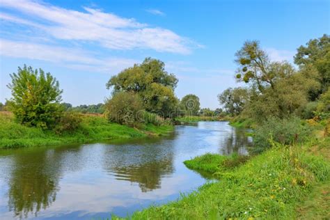 View Of Small River Against Blue Sky In Autumn Morning River Landscape