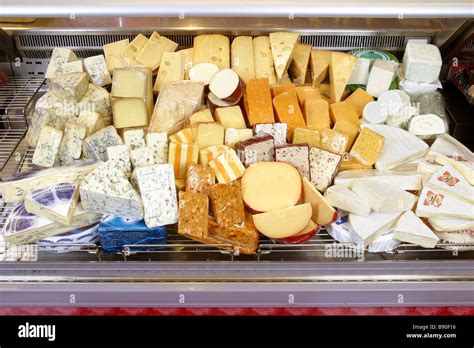 Cheese Display On Supermarket Counter Stock Photo Alamy
