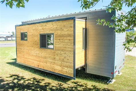 Tiny House That Expands To 374 Sq Ft Using Slide Outs