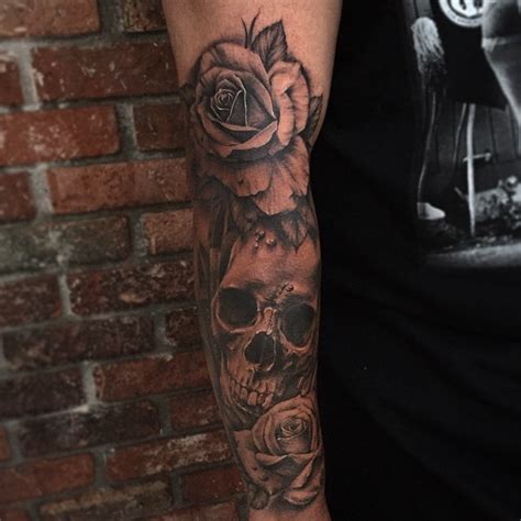 The colors of the roses are divine, they look almost like velvet. Skull and Roses Sleeve Tattoo ~ Tattoo Geek - Ideas for ...