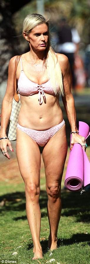 Former Neighbours Star Emma Harrison Strips Down To A Skimpy Bikini Daily Mail Online