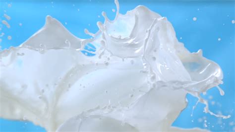 Milk Waves Splashing On Blue Stock Footage Video 100 Royalty Free