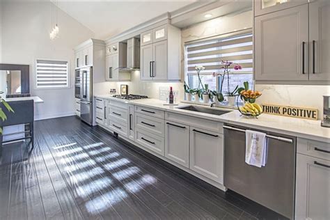 You can select between different styles of kitchen and choose something. Transitional Kitchen Design in Grey & Black | Kitchen Land ...