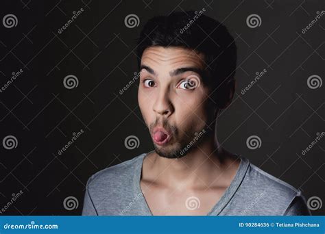 Portrait Of A Normal Boy Over Grey Background Stock Photography