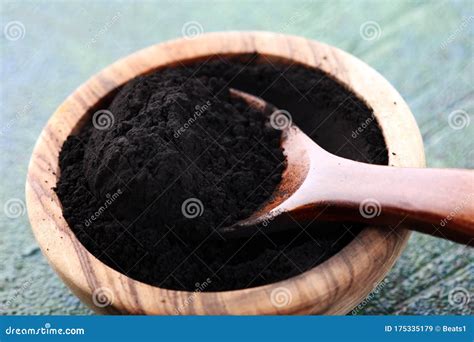 Activated Charcoal Powder Black Charcoal Powder On Table Stock Image