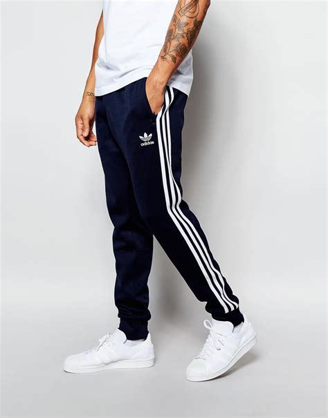 Adidas Originals Superstar Cuffed Track Pants Aj6961 Blue In Blue For